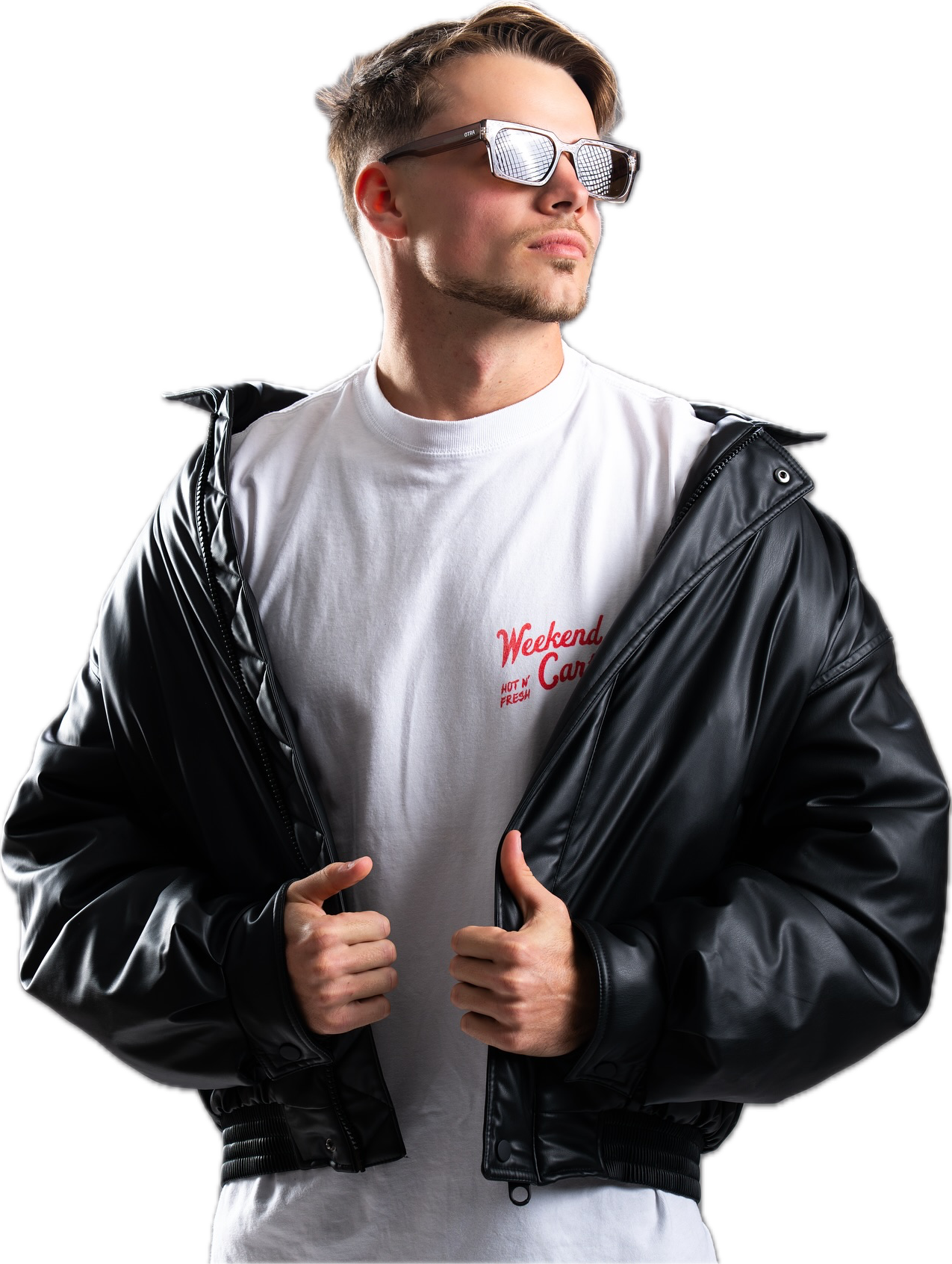 Davon Goodchild, wearing mirrored sunglasses and a black jacket over a white t-shirt